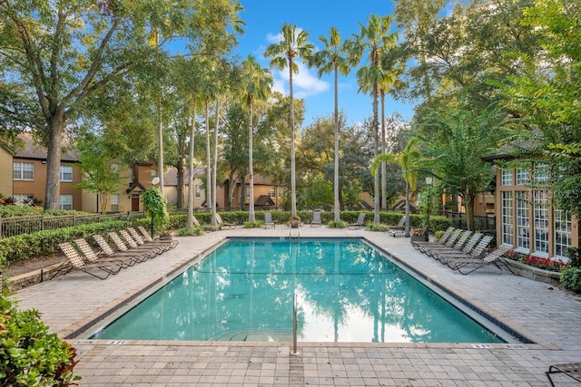 view of swimming pool featuring a patio