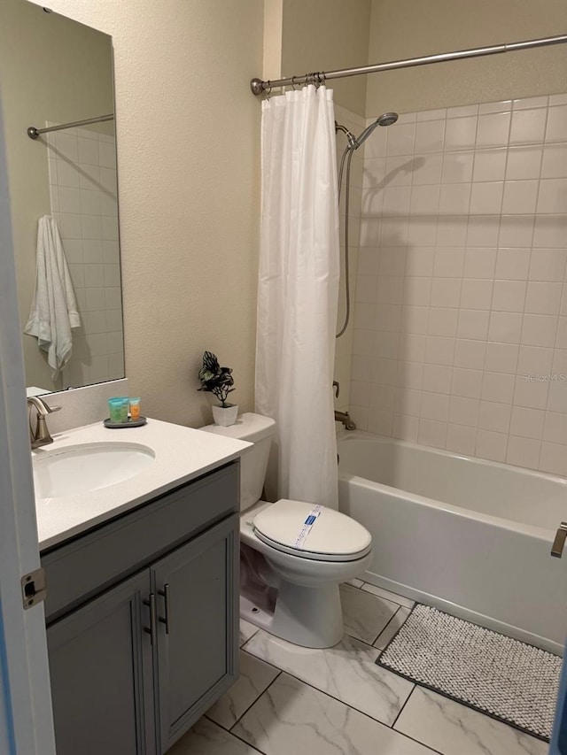 full bathroom featuring toilet, shower / bath combo, and vanity