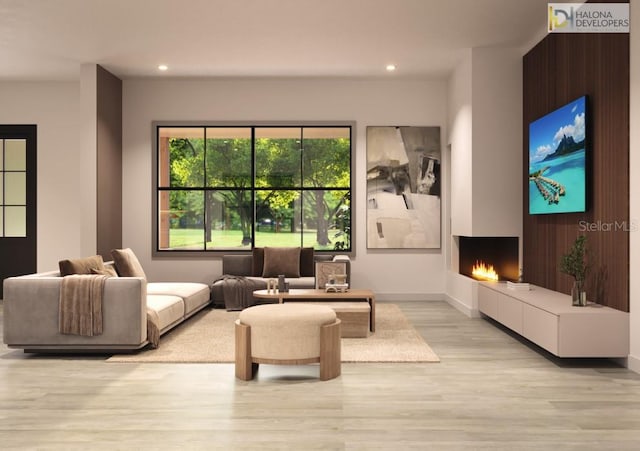 living room with light wood-type flooring and a tile fireplace