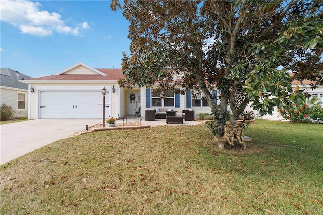 view of front of house featuring a garage and a front lawn