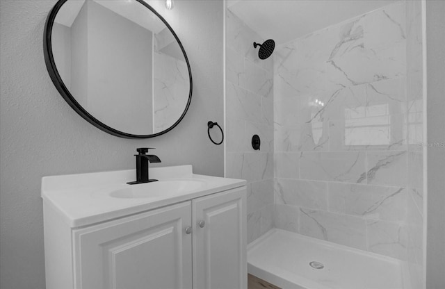 bathroom with vanity and walk in shower