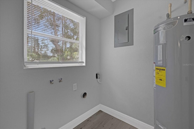 laundry area featuring washer hookup, electric panel, hookup for an electric dryer, water heater, and wood-type flooring