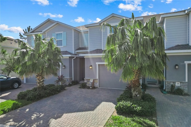 view of front of home with a garage