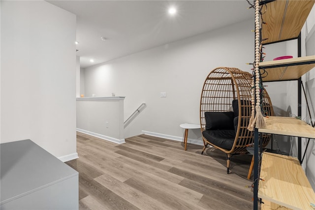 sitting room with light hardwood / wood-style floors