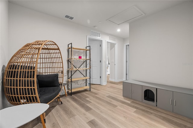 living area featuring light wood-type flooring