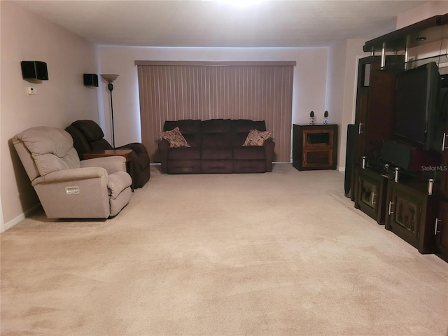 living room with light colored carpet