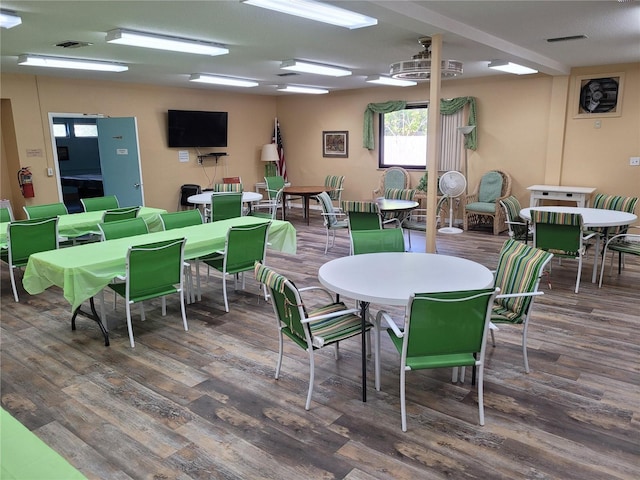 dining room featuring dark wood-type flooring