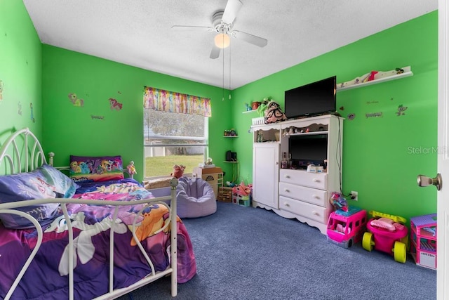 bedroom featuring a textured ceiling, carpet flooring, and ceiling fan