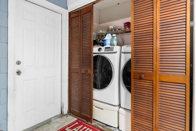 laundry area featuring washer and clothes dryer