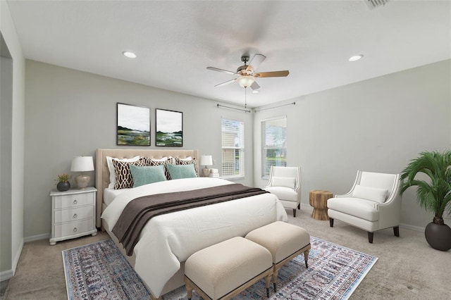 bedroom with light colored carpet and ceiling fan