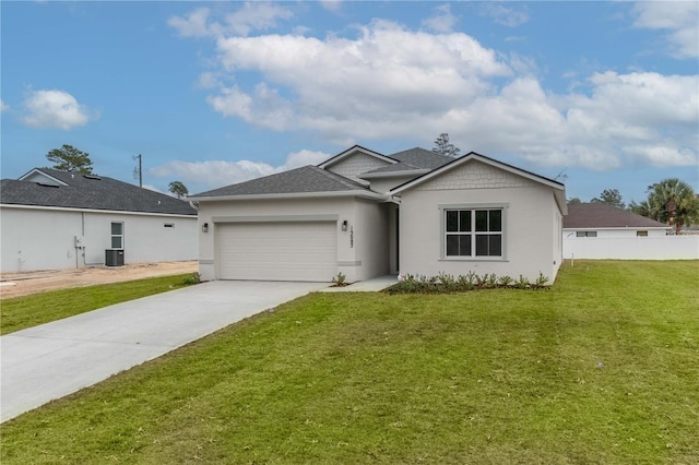 ranch-style house with a garage and a front lawn