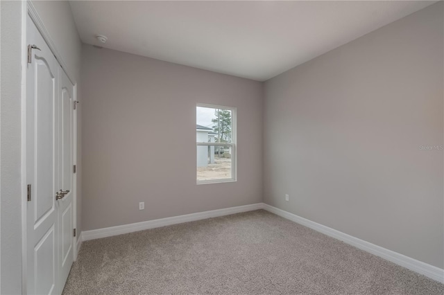 unfurnished bedroom featuring carpet floors