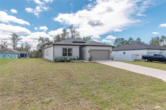 view of front of home featuring driveway, a garage, fence, a front lawn, and stucco siding