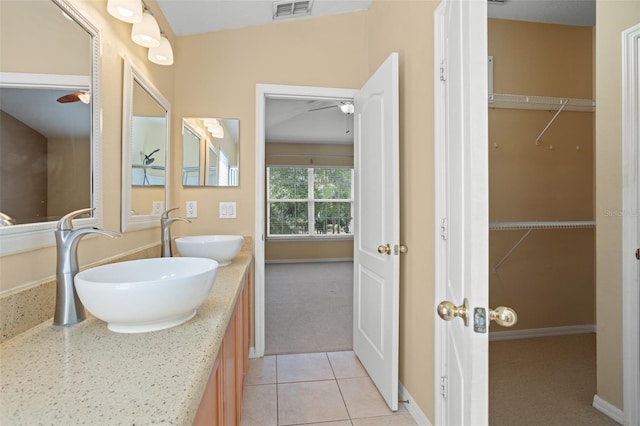 bathroom with vanity and tile patterned flooring