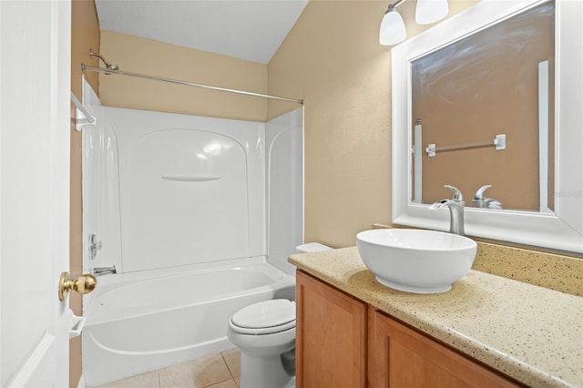 full bathroom featuring toilet, vanity, washtub / shower combination, and tile patterned flooring