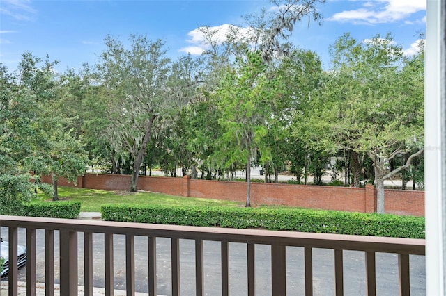 view of yard featuring a balcony