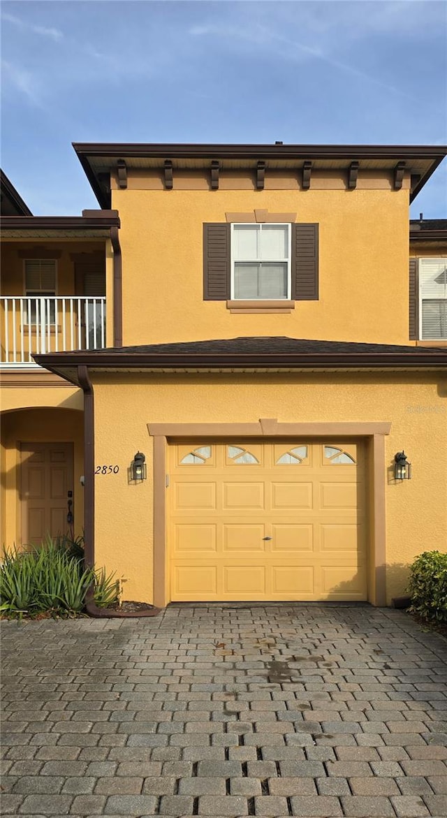 exterior space with a garage