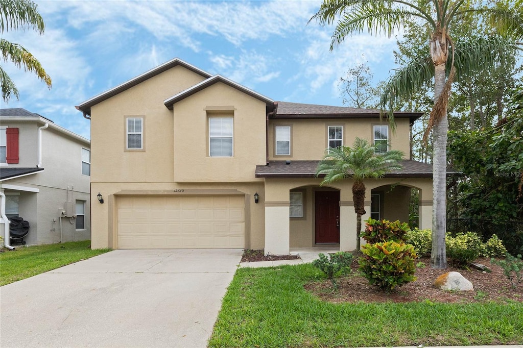 view of front of home with a garage