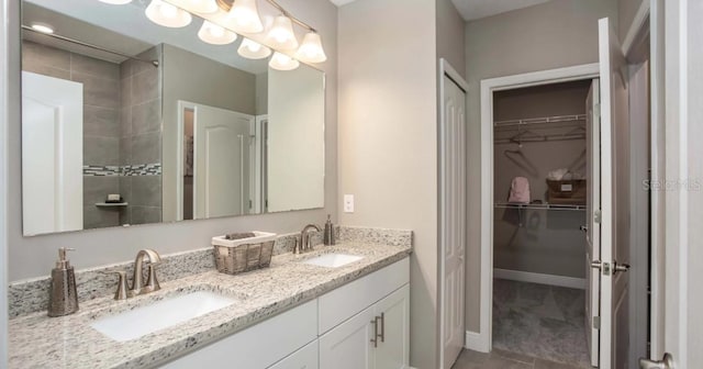 bathroom featuring vanity and tile patterned flooring