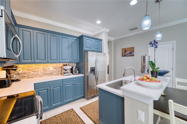 kitchen featuring blue cabinetry, sink, stainless steel appliances, pendant lighting, and light tile patterned flooring