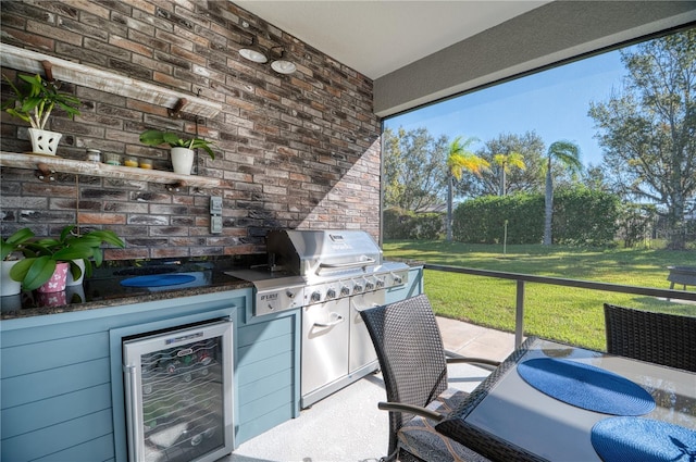 view of patio / terrace featuring wine cooler and exterior kitchen