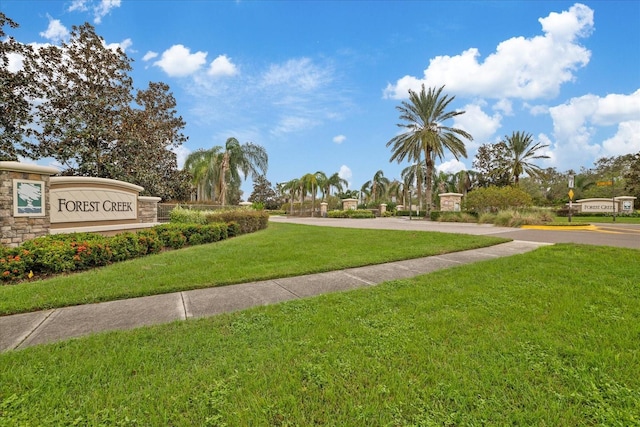 view of community featuring a yard