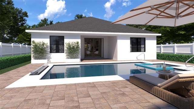 rear view of house with a patio and a fenced in pool