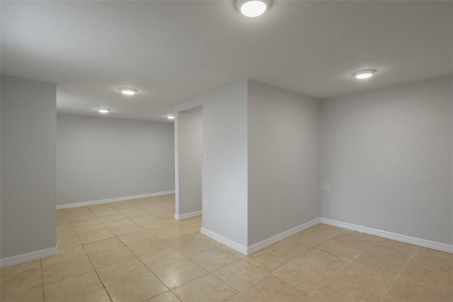 basement with light tile patterned floors