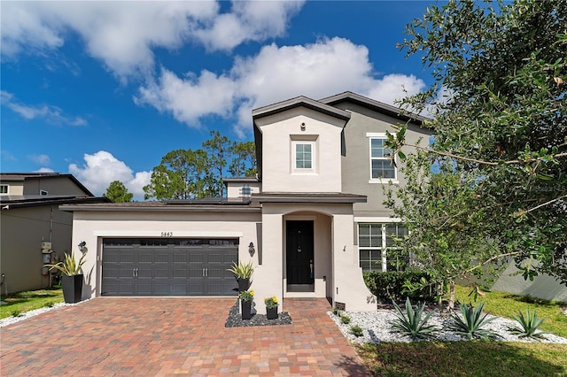 front of property with a garage