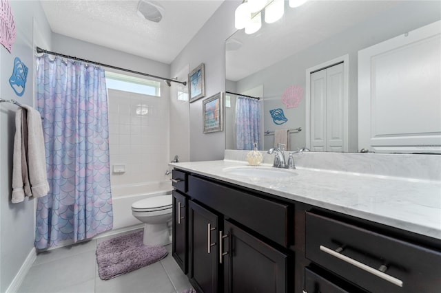 full bathroom with shower / bath combination with curtain, a textured ceiling, toilet, vanity, and tile patterned floors