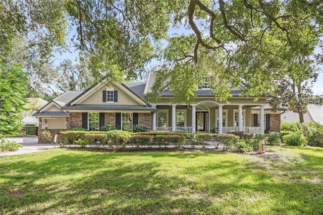 craftsman-style home with a porch and a front lawn