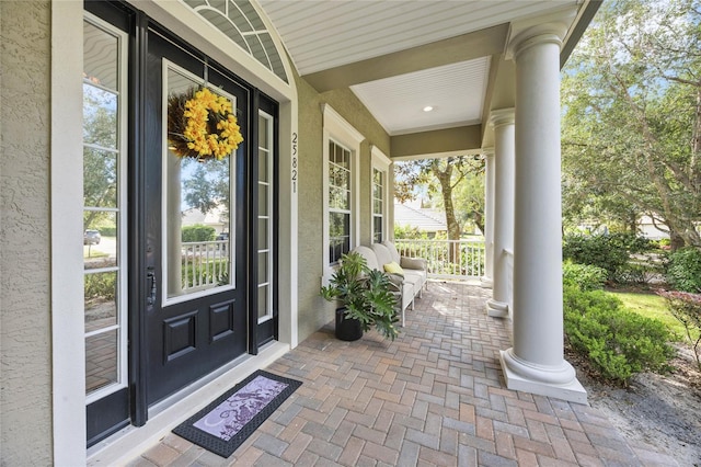 property entrance with a porch