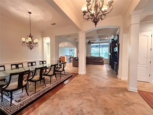 dining space featuring ceiling fan with notable chandelier, decorative columns, crown molding, and coffered ceiling