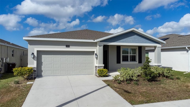 view of front of home with a garage and a porch