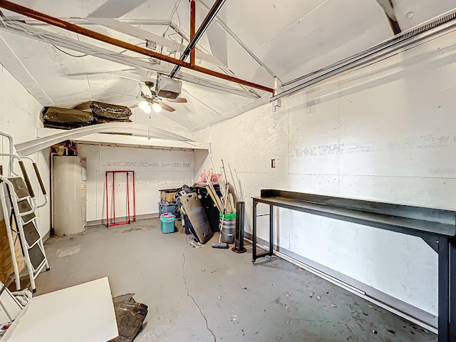 garage with ceiling fan, a garage door opener, and water heater