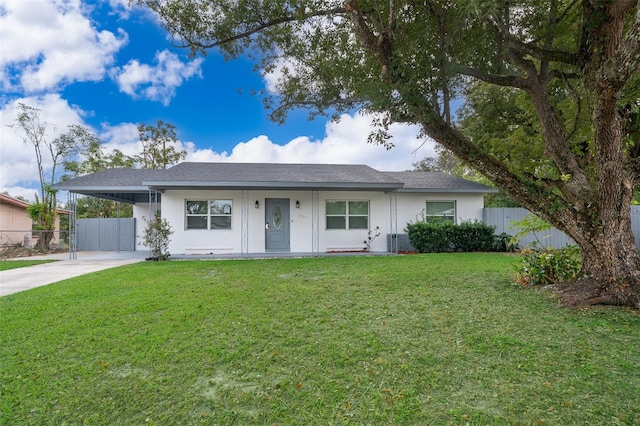3703 Wade Rd, Orlando, FL 32808 - single story home with an attached carport and concrete driveway