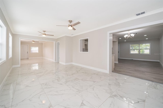 empty room with ornamental molding, light hardwood / wood-style flooring, and ceiling fan with notable chandelier