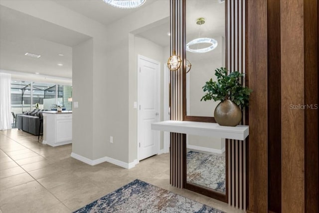 corridor featuring light tile patterned floors