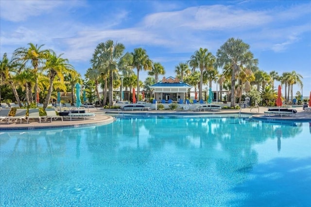 view of swimming pool featuring a patio area