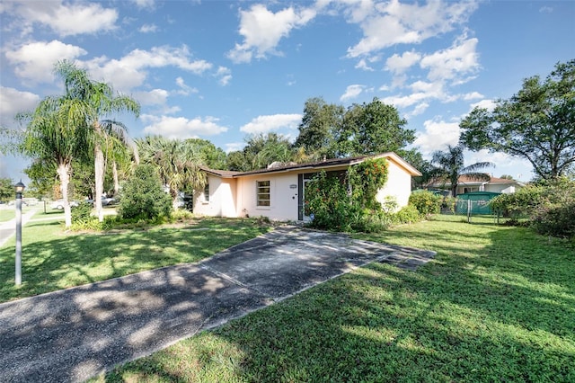 view of front of house with a front lawn