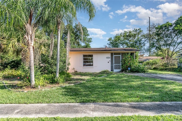 view of front of house with a front lawn