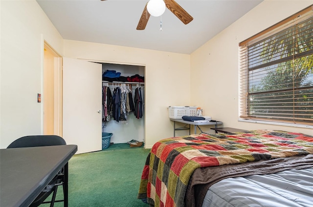 carpeted bedroom featuring a closet and ceiling fan