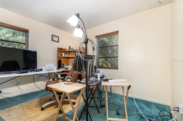 office area with a wealth of natural light and carpet floors