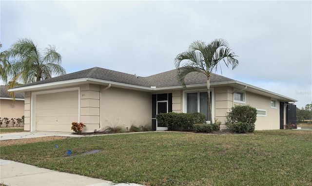 single story home featuring a front yard and a garage