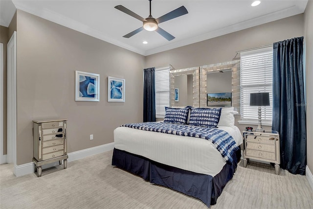 bedroom with ceiling fan, light colored carpet, and ornamental molding