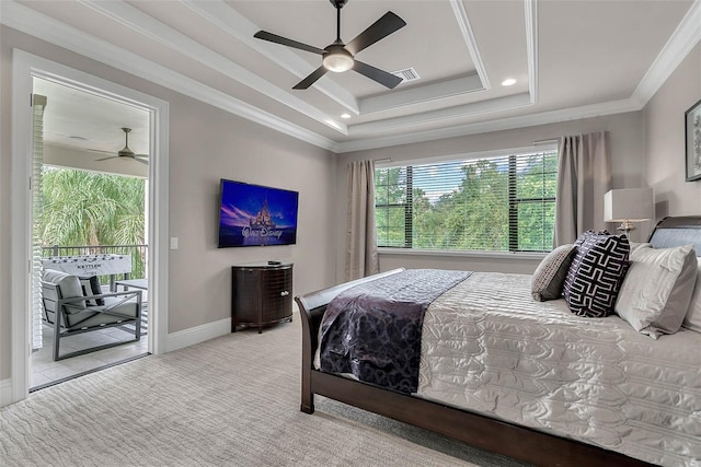 carpeted bedroom featuring access to outside, ceiling fan, a tray ceiling, and ornamental molding