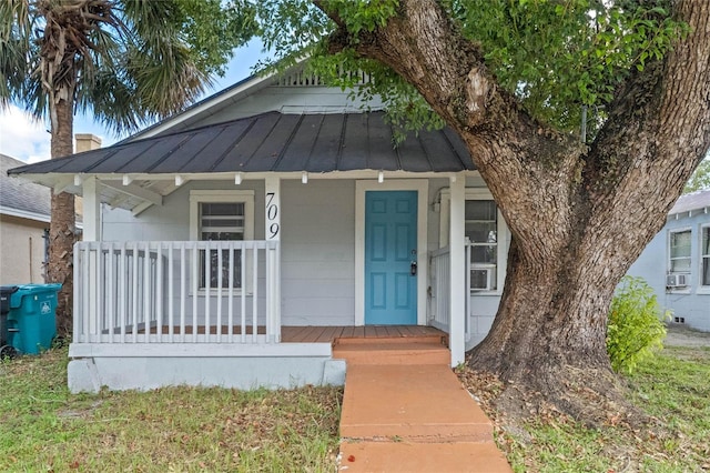 bungalow-style home with covered porch