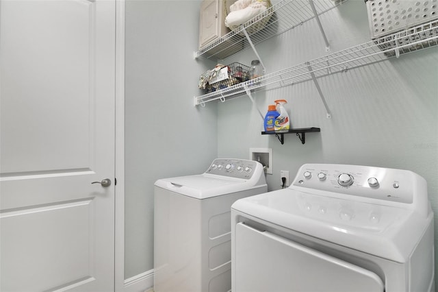 laundry area featuring independent washer and dryer