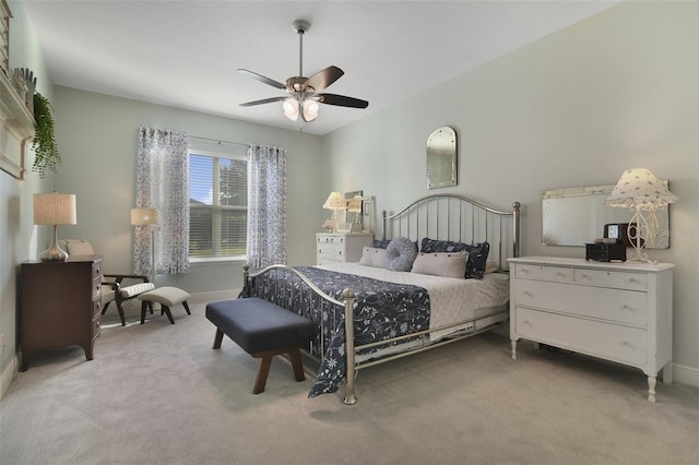 bedroom featuring ceiling fan and light colored carpet