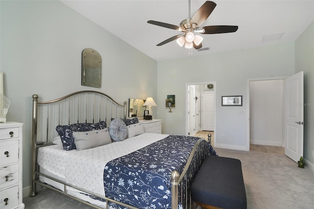 bedroom with light carpet and ceiling fan